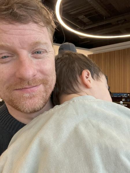 Tom Foley's son, Ben, napping on his shoulder